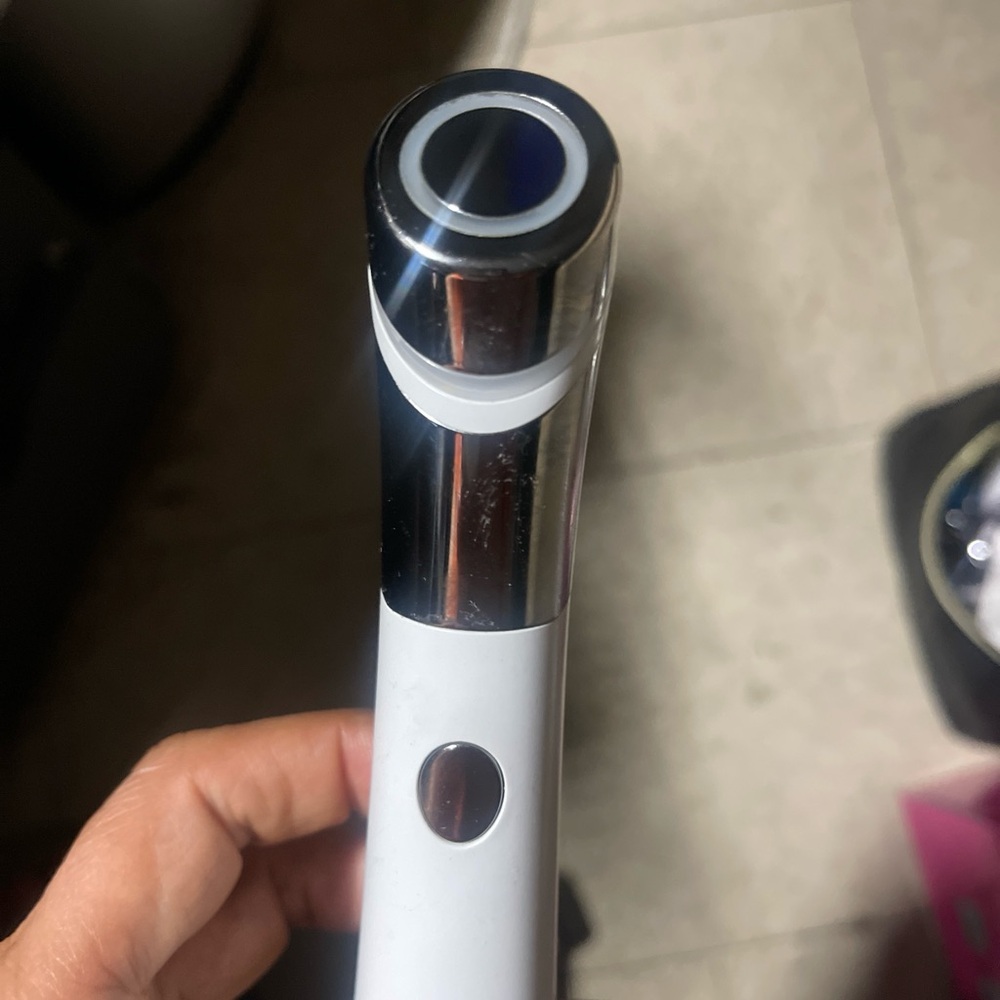 Silver and White Skincare Tool